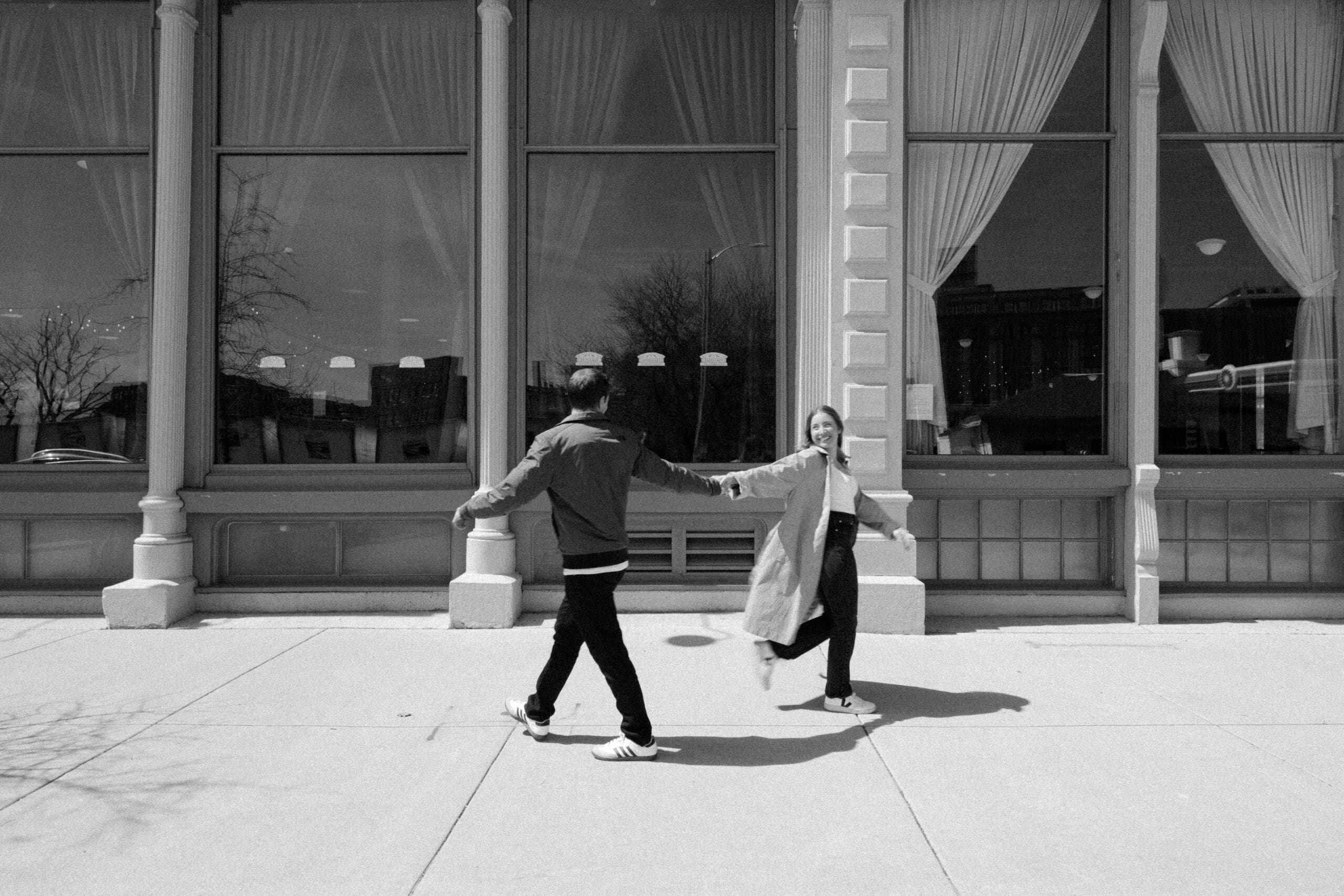 couple in Milwaukee being playful