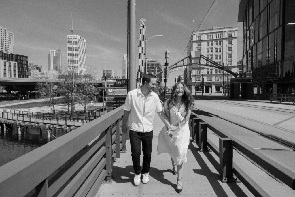 walking downtown Milwaukee WI hand in hand